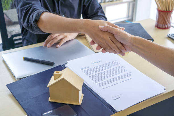 Real estate agent hand shaker